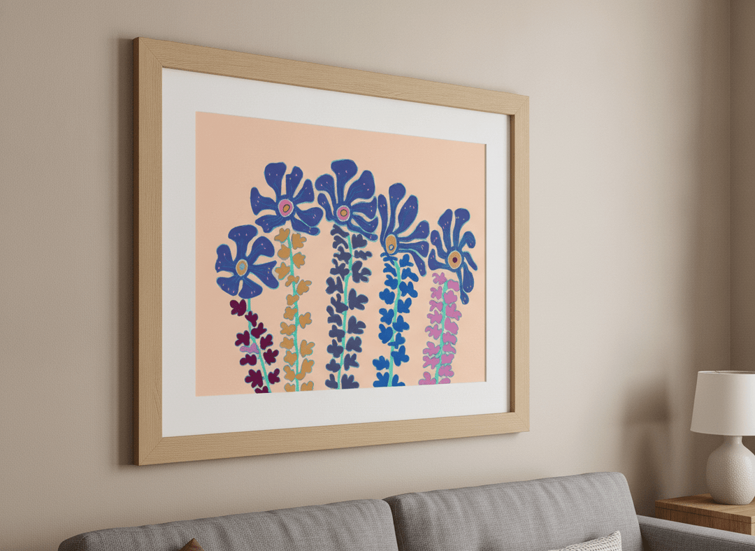Modern wall art styled above a sofa in a neutral living room