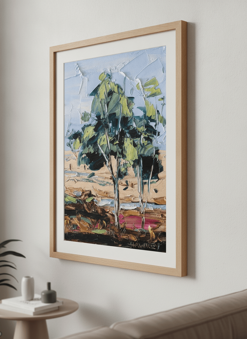 Modern wall art styled above a sofa in a neutral living room