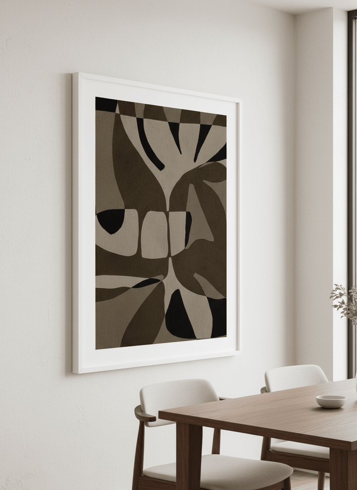 Wall art styled above a dining table in a contemporary home