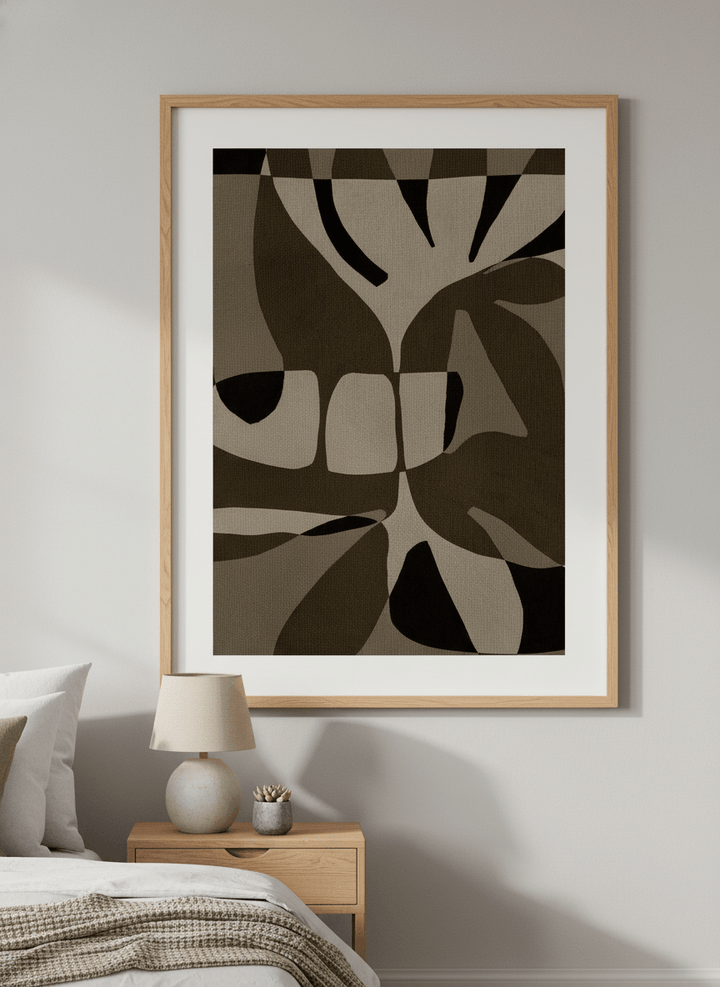 Minimalist artwork displayed in a calm, light-filled bedroom interior