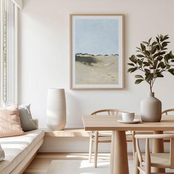 Modern living room with a landscape picture, white vase, and wooden furniture.