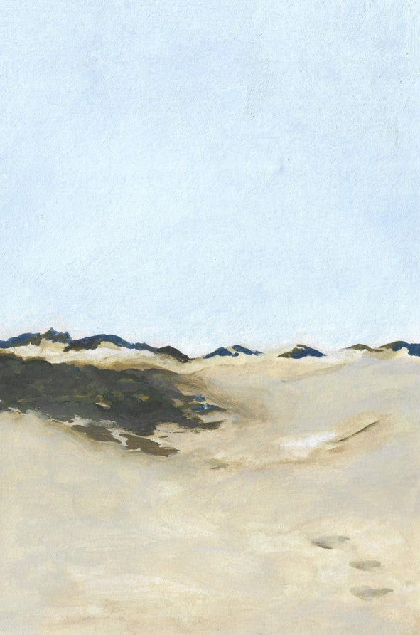 Desert landscape with sand dunes and a clear sky framed