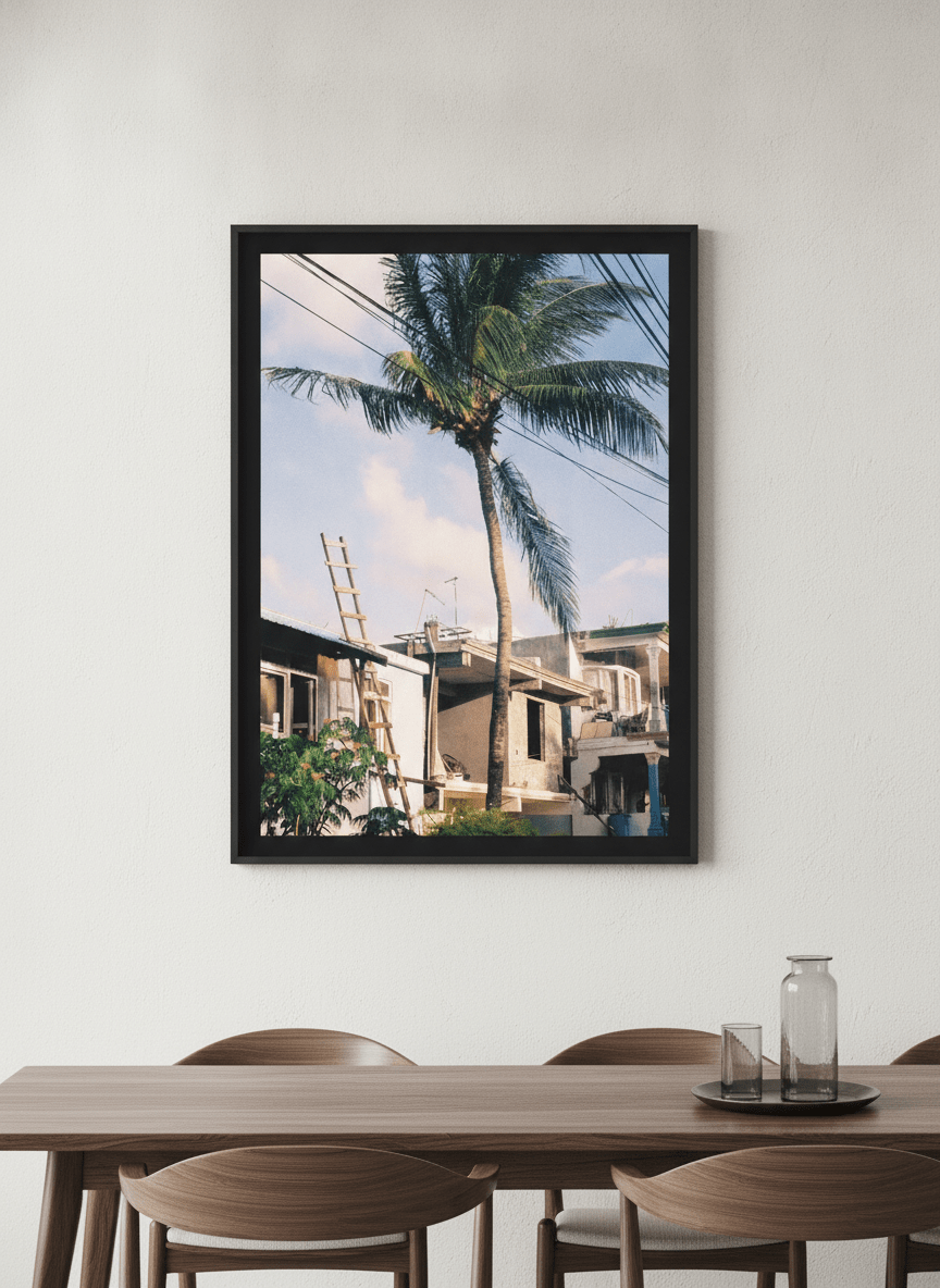 Wall art styled above a dining table in a contemporary home