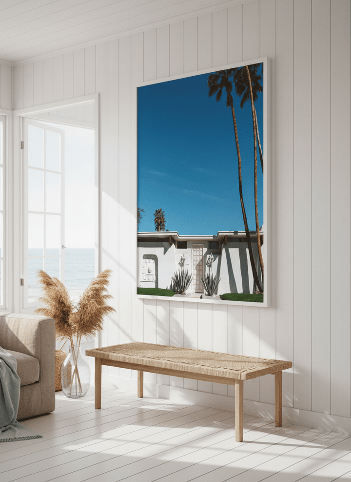 Neutral wall art displayed in a sunny coastal beach house