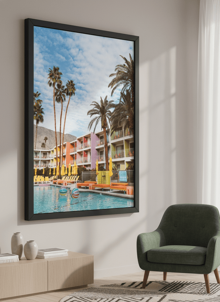 Modern wall art styled above a sofa in a neutral living room