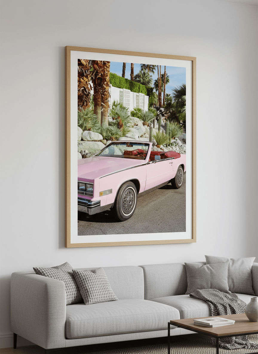 Modern wall art styled above a sofa in a neutral living room