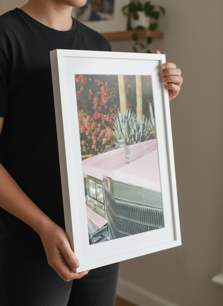 Person showcasing the artwork against a clean modern interior wall