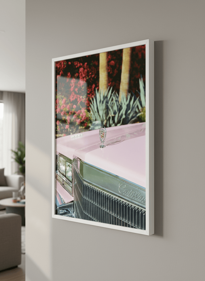Modern wall art styled above a sofa in a neutral living room