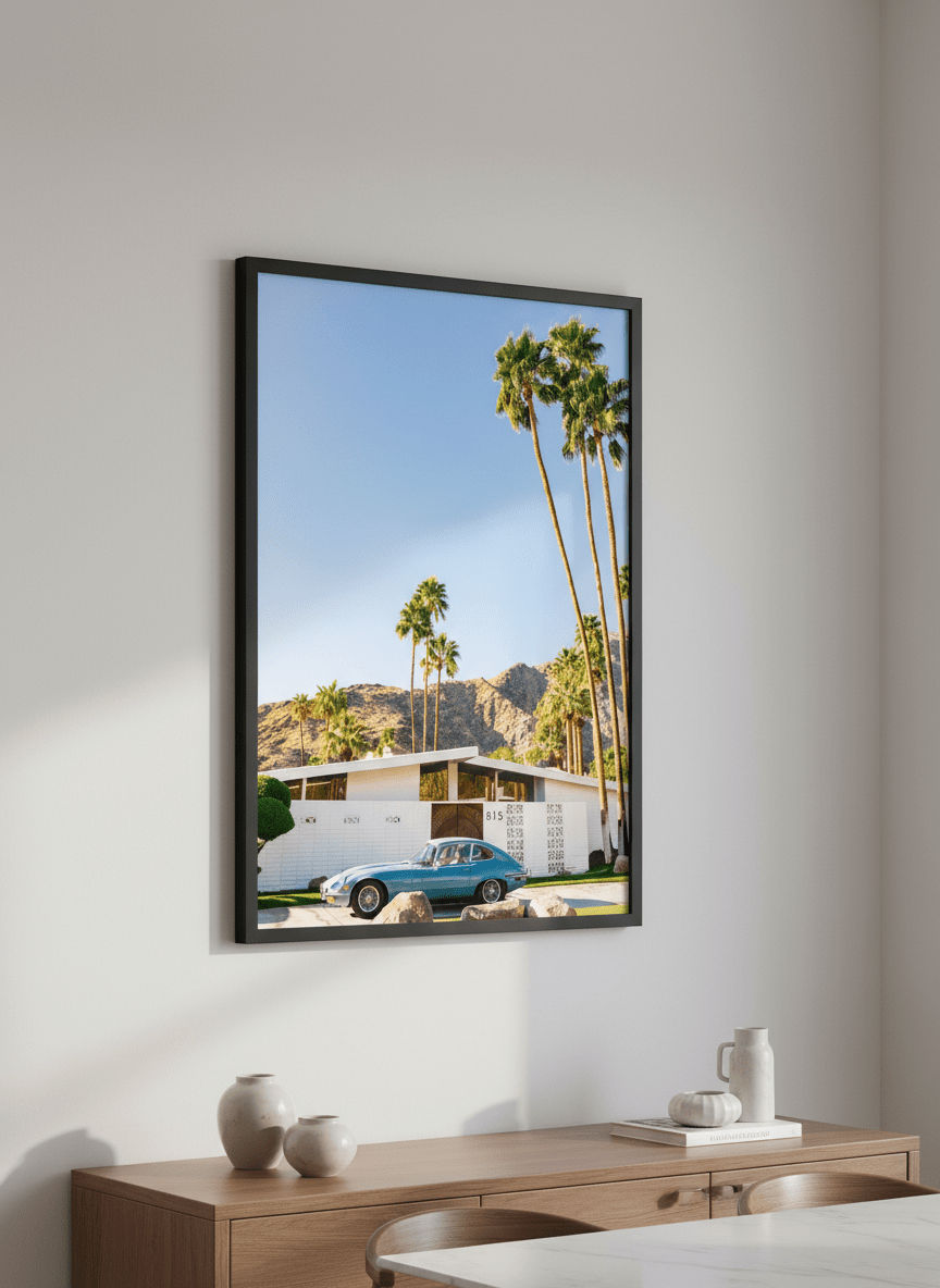 Wall art styled above a dining table in a contemporary home
