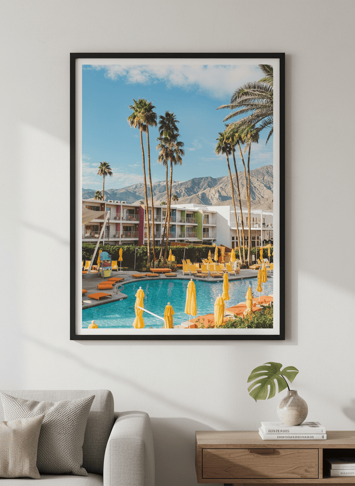 Modern wall art styled above a sofa in a neutral living room