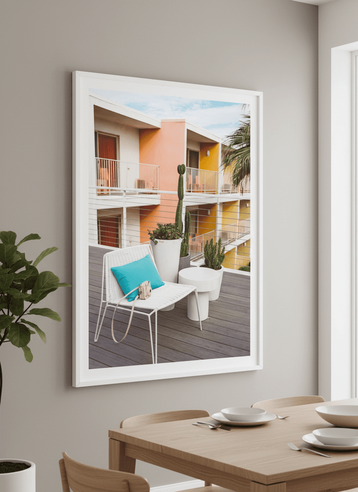 Wall art styled above a dining table in a contemporary home