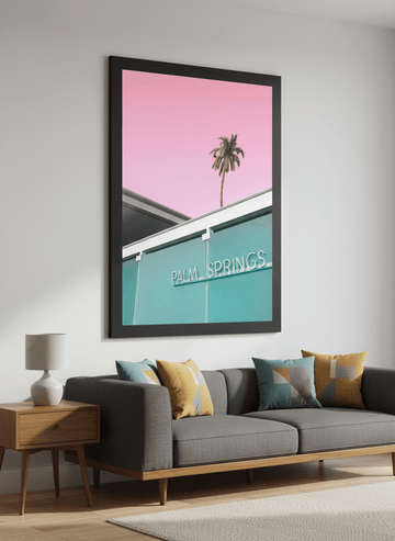 Modern wall art styled above a sofa in a neutral living room