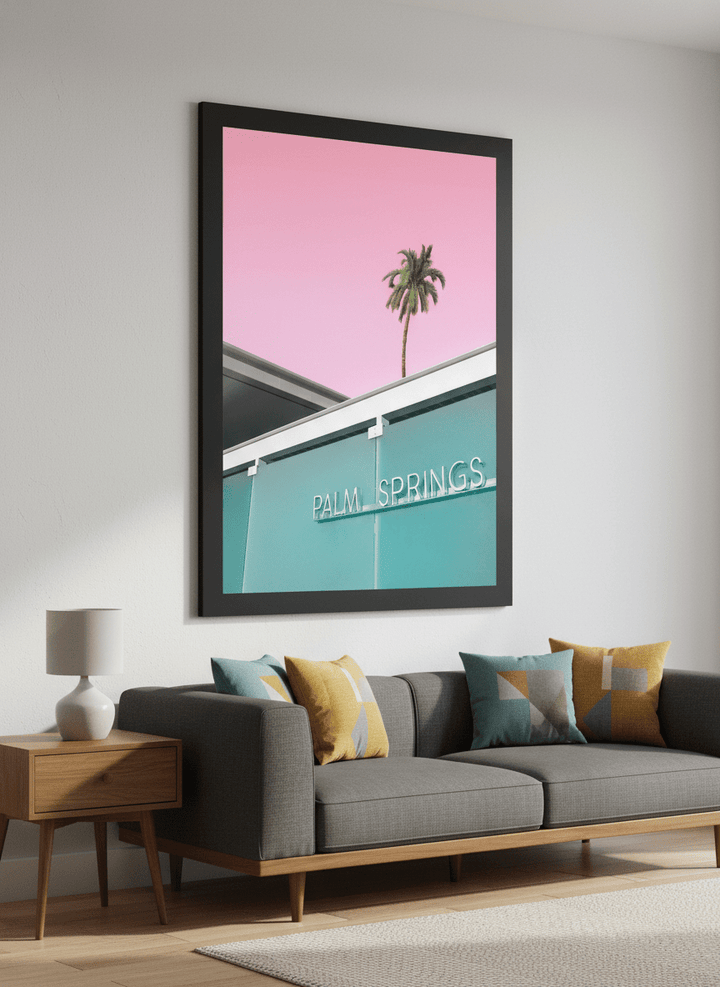 Modern wall art styled above a sofa in a neutral living room