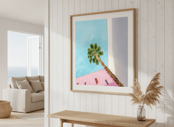 Neutral wall art displayed in a sunny coastal beach house