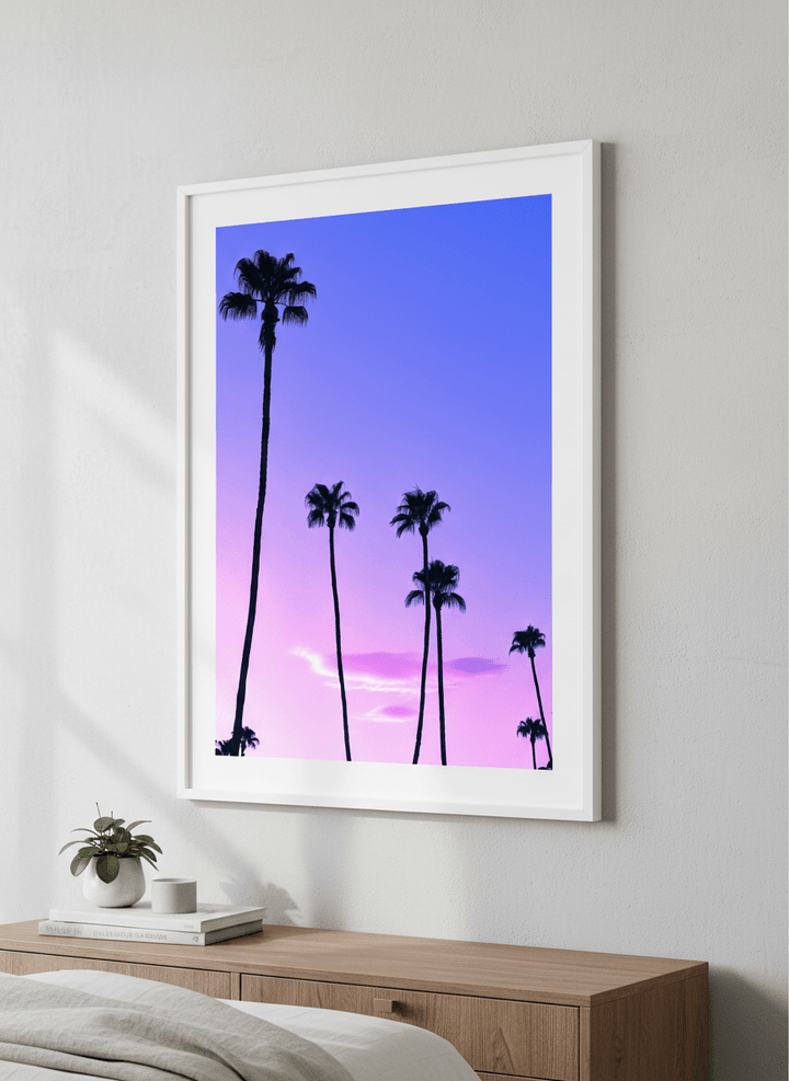 Minimalist artwork displayed in a calm, light-filled bedroom interior