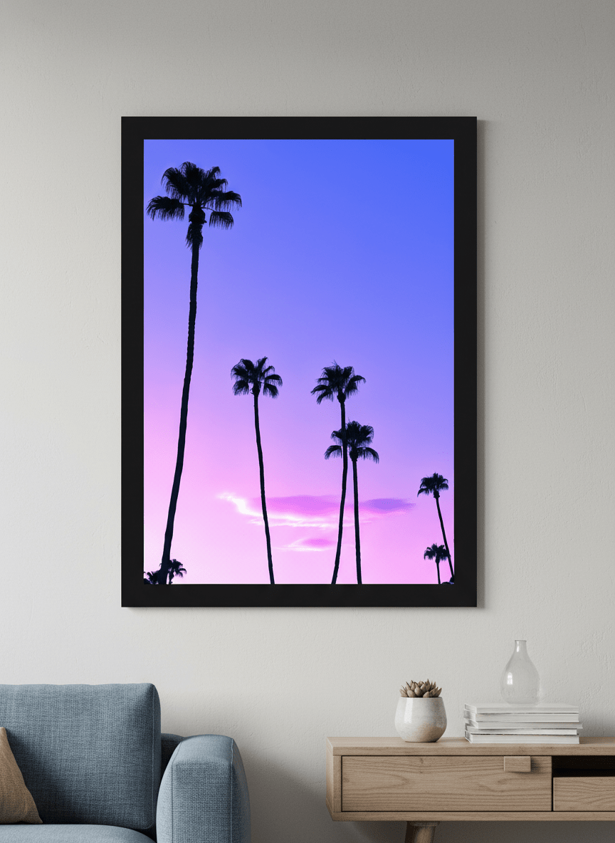 Modern wall art styled above a sofa in a neutral living room