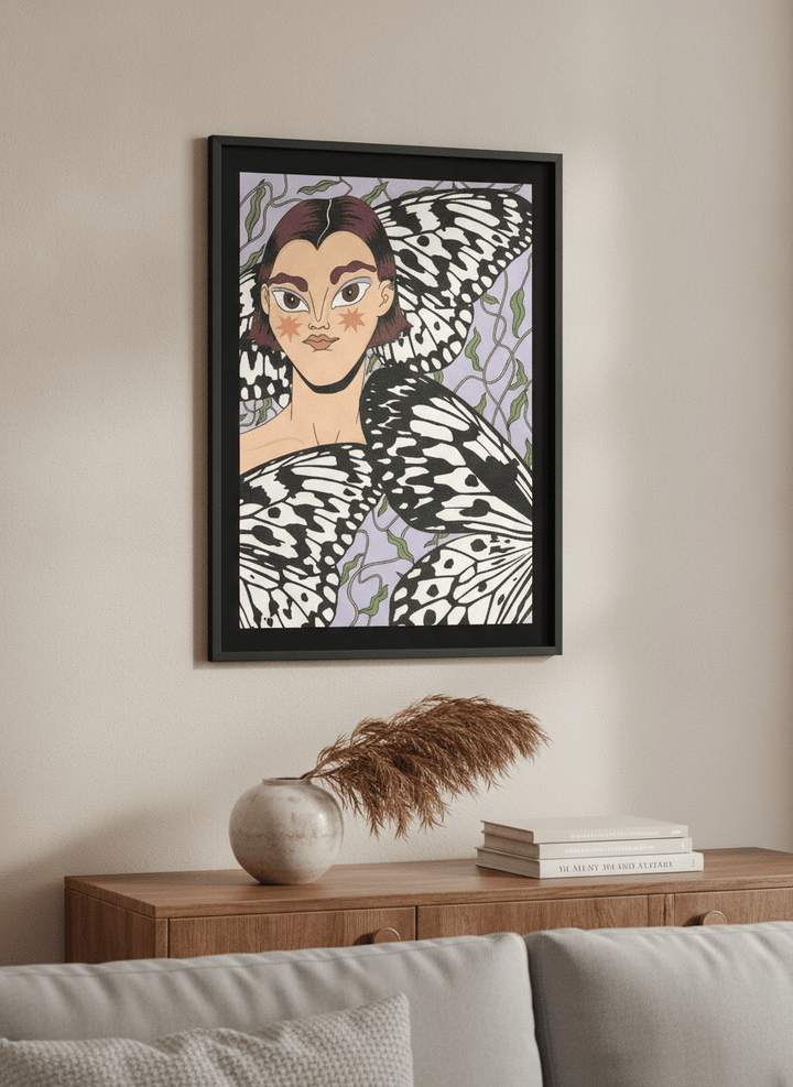 Modern wall art styled above a sofa in a neutral living room