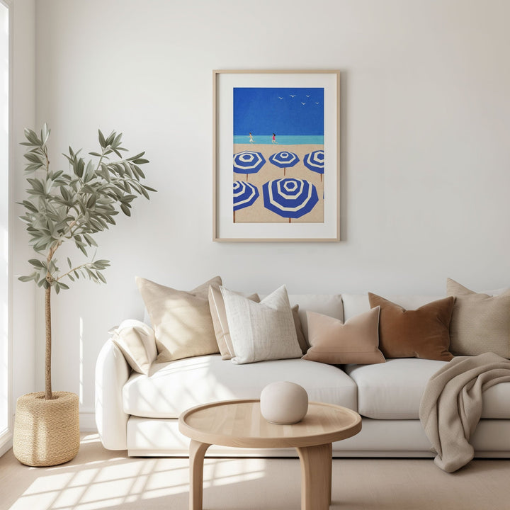 artwork of blue colored parasols on coastal living room