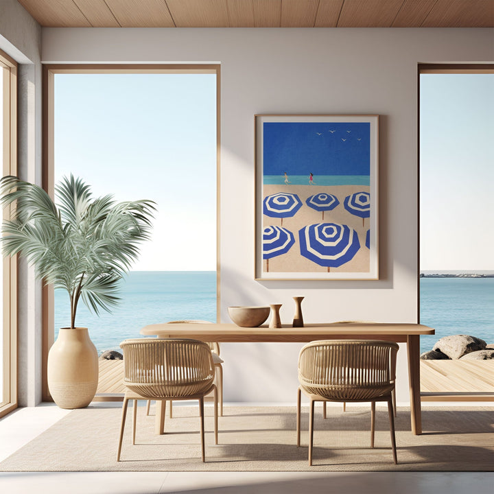 coastal dining room with blue and white parasol artwork on wall