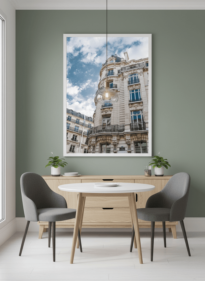Wall art styled above a dining table in a contemporary home