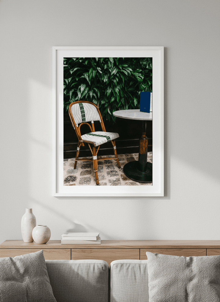 Modern wall art styled above a sofa in a neutral living room