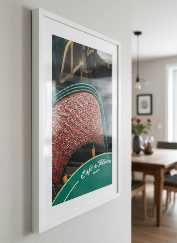 Wall art styled above a dining table in a contemporary home