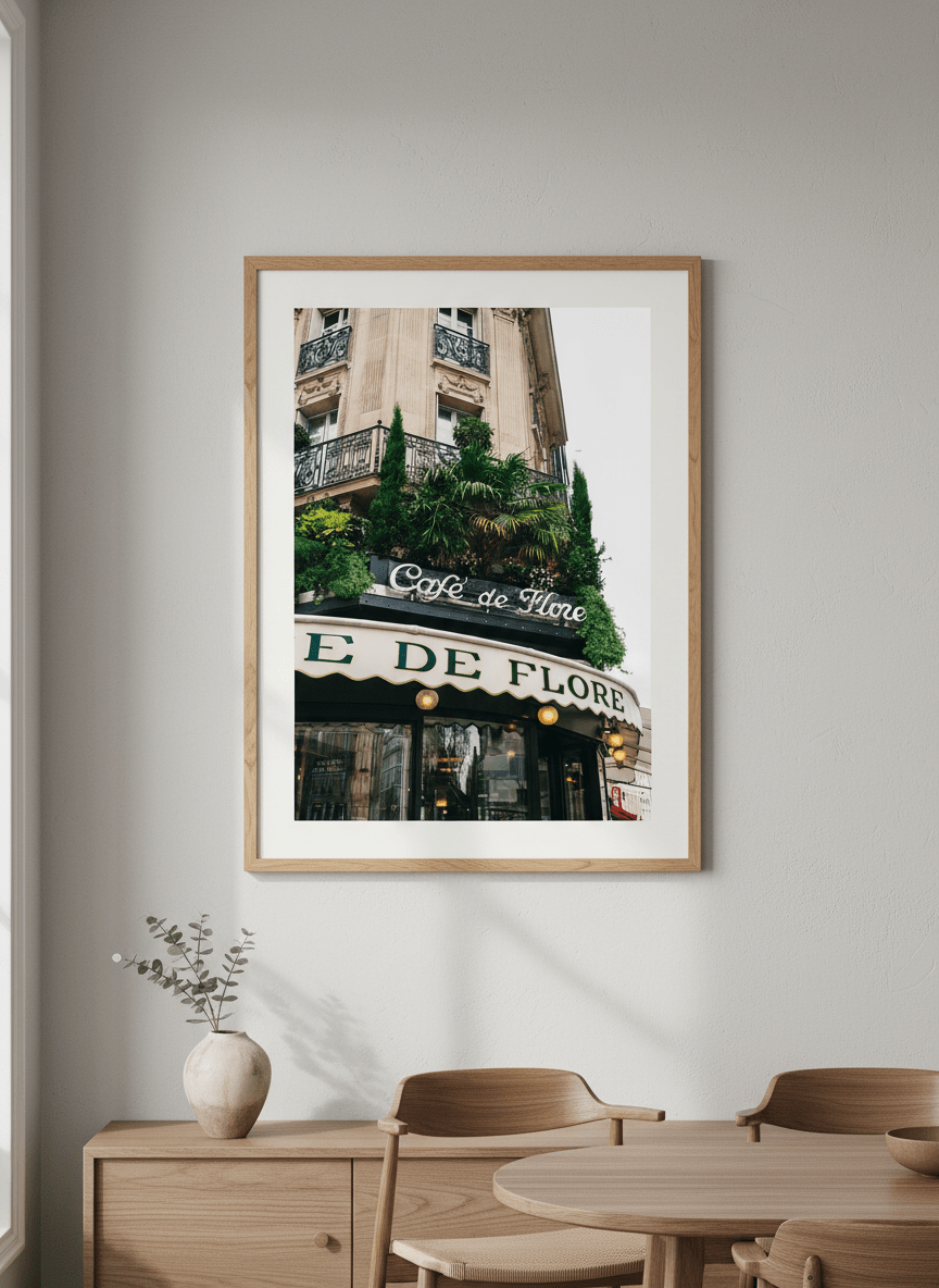Wall art styled above a dining table in a contemporary home