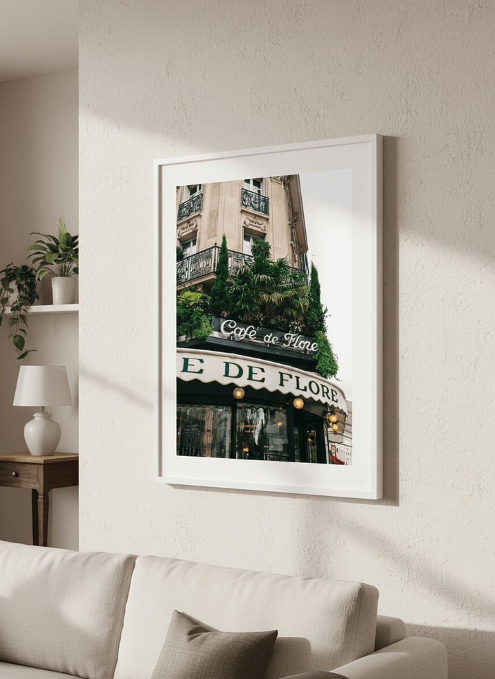 Modern wall art styled above a sofa in a neutral living room