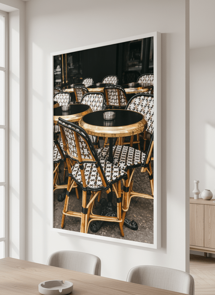 Wall art styled above a dining table in a contemporary home