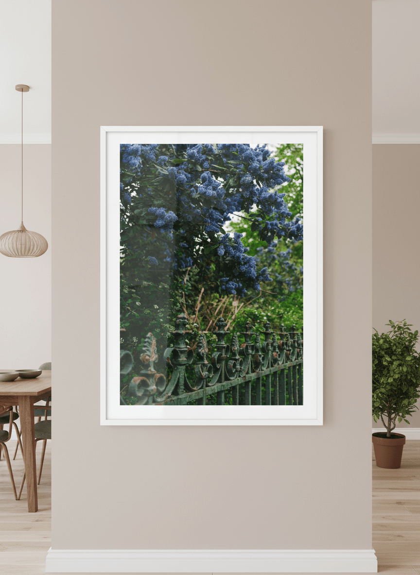 Wall art styled above a dining table in a contemporary home