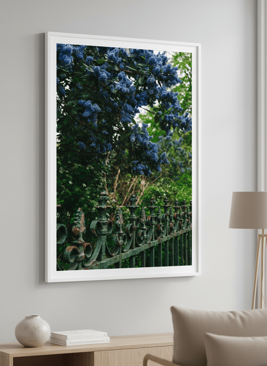 Modern wall art styled above a sofa in a neutral living room