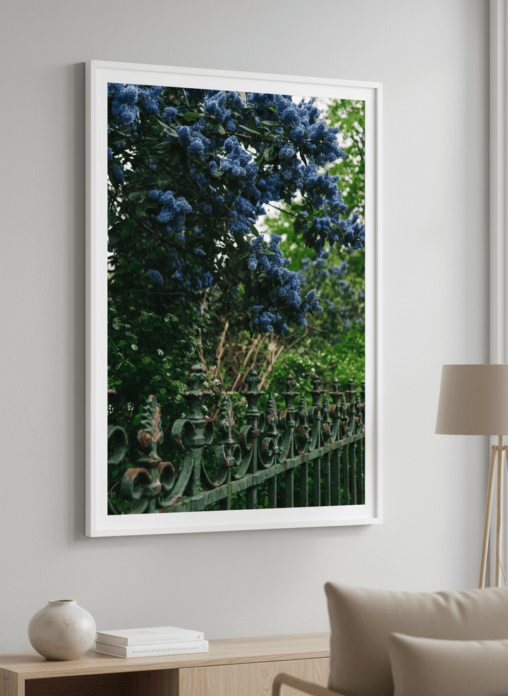 Modern wall art styled above a sofa in a neutral living room