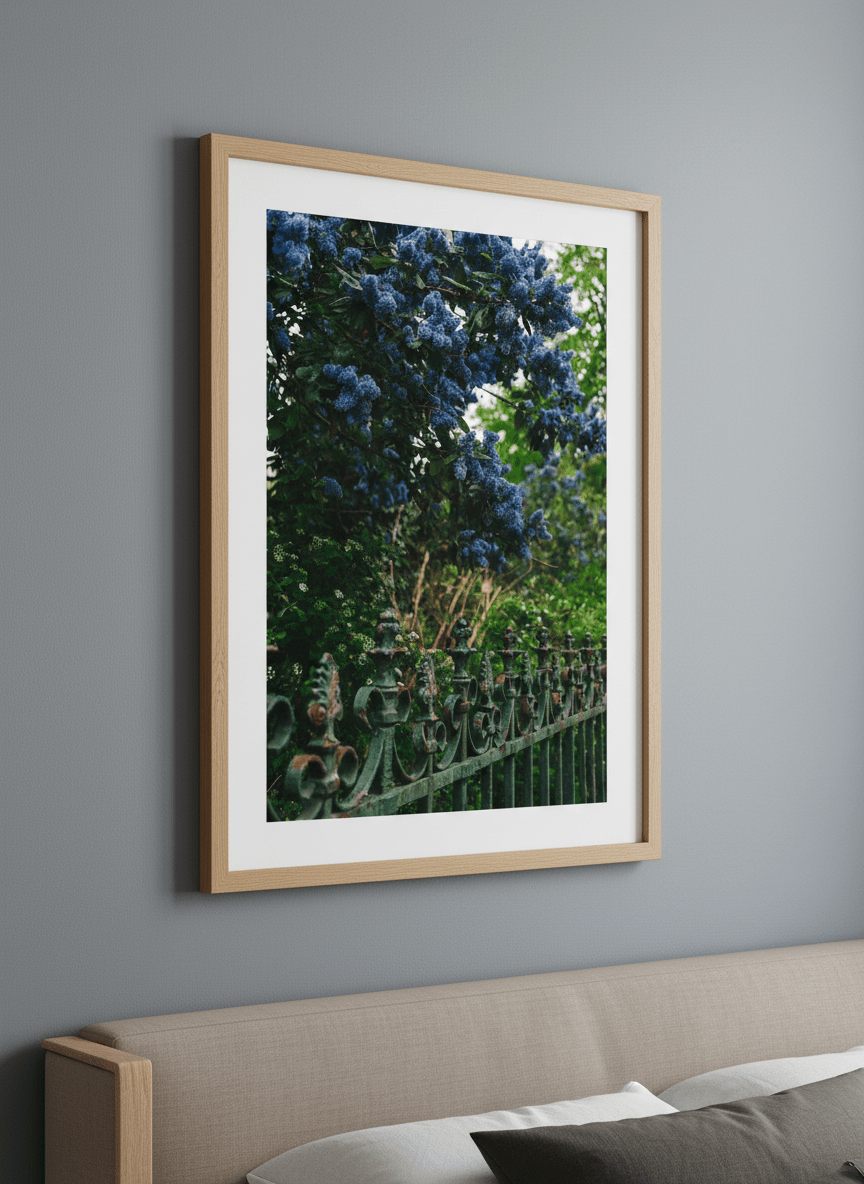 Minimalist artwork displayed in a calm, light-filled bedroom interior
