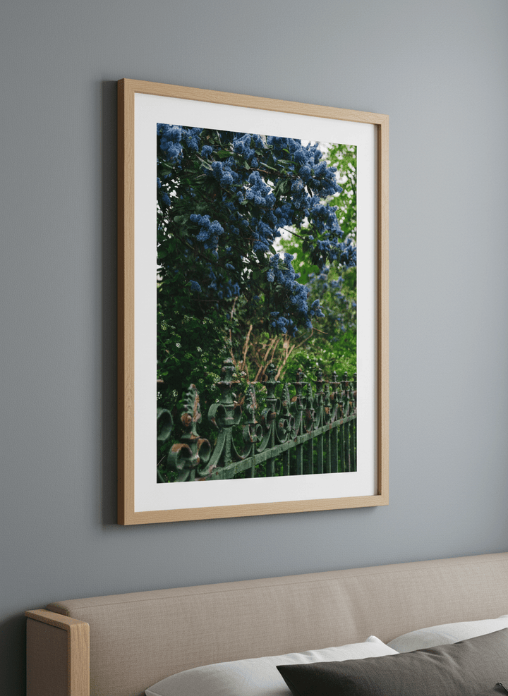 Minimalist artwork displayed in a calm, light-filled bedroom interior