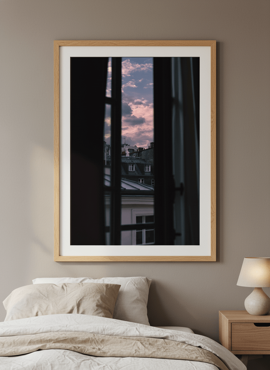 Minimalist artwork displayed in a calm, light-filled bedroom interior