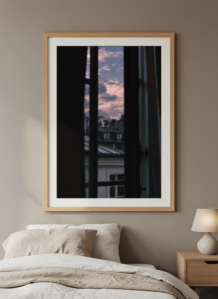 Minimalist artwork displayed in a calm, light-filled bedroom interior