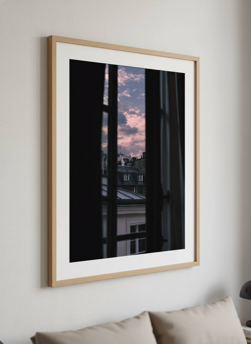 Minimalist artwork displayed in a calm, light-filled bedroom interior