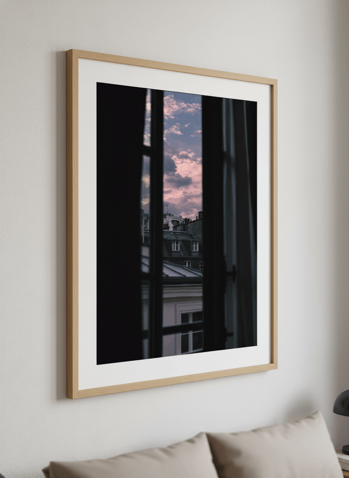 Minimalist artwork displayed in a calm, light-filled bedroom interior