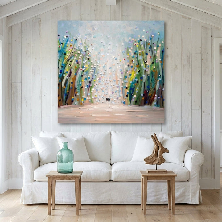 Stretched canvas wall art styled on the wall in a coastal living room
