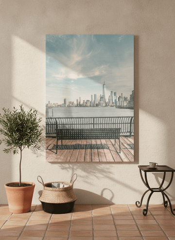 Stretched canvas wall art leaning against the wall in a Mediterranean bedroom