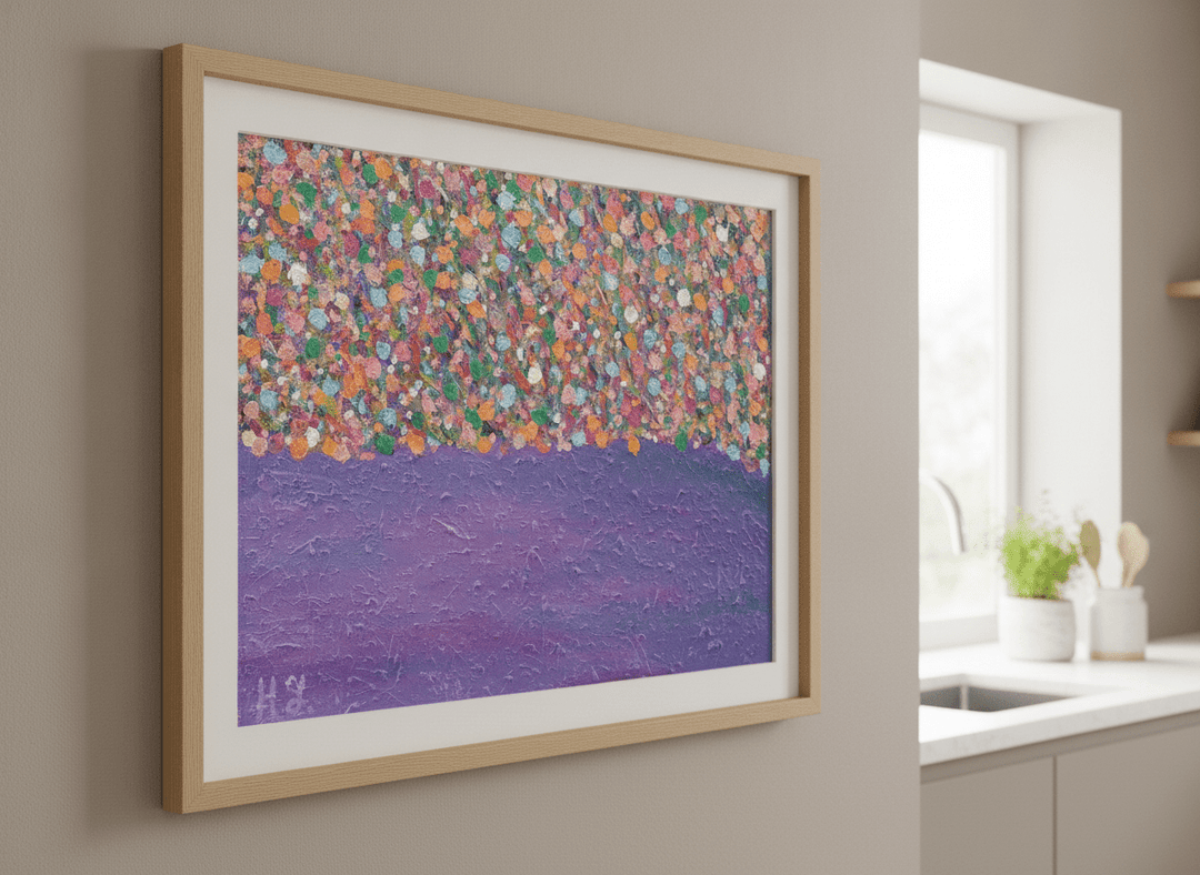 Artwork styled on the wall of a bright modern kitchen
