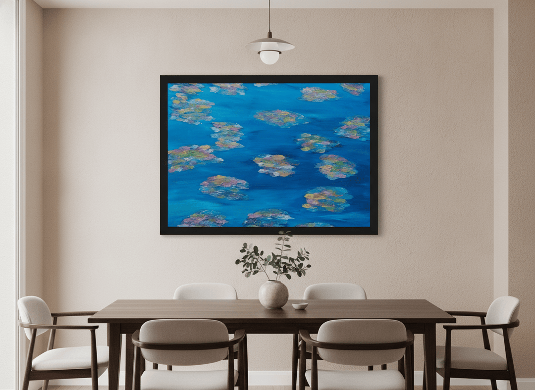 Wall art styled above a dining table in a contemporary home