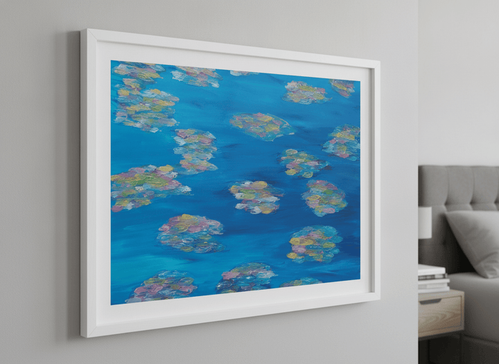 Minimalist artwork displayed in a calm, light-filled bedroom interior
