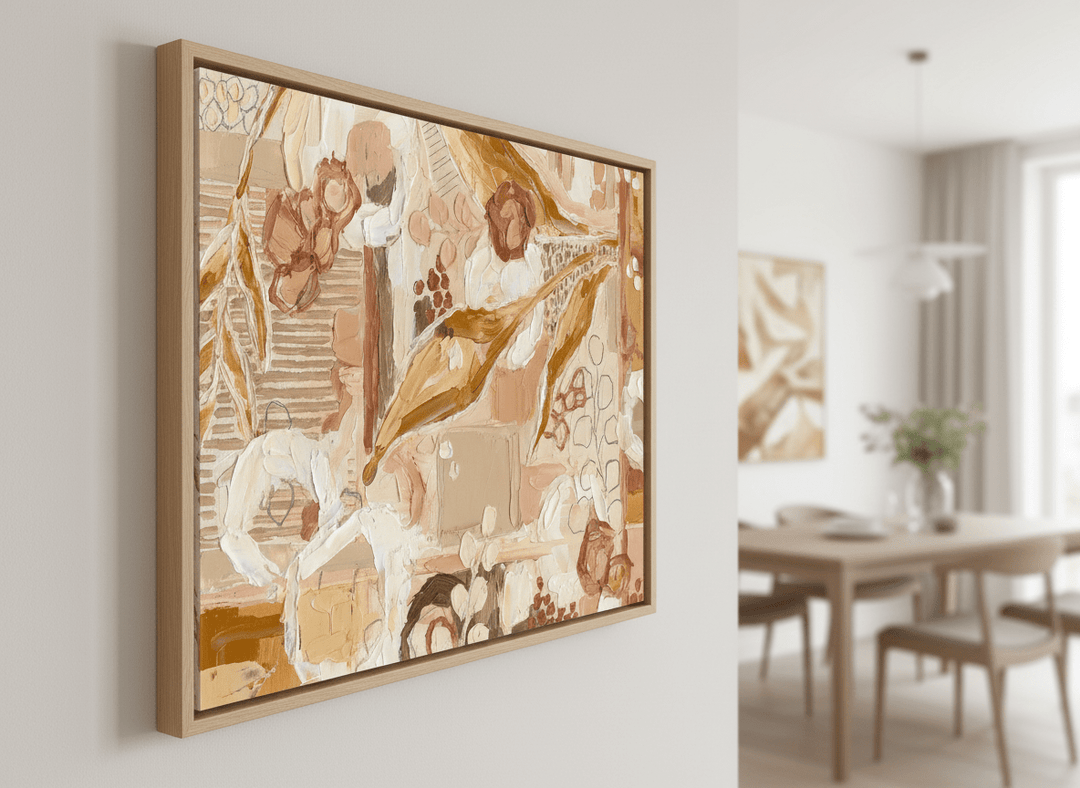 Wall art styled above a dining table in a contemporary home