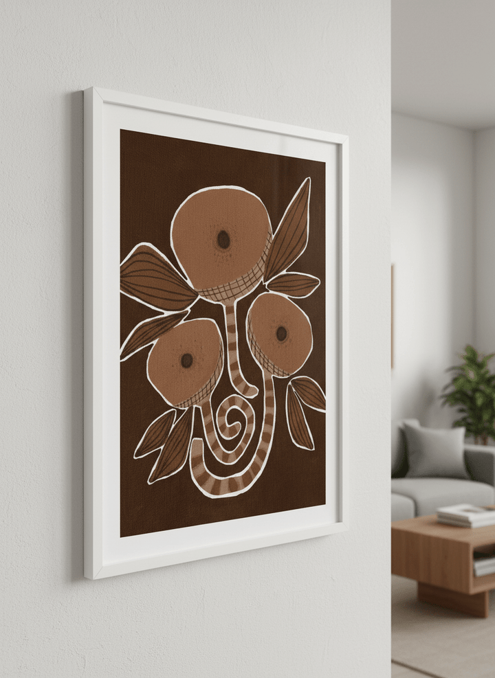 Modern wall art styled above a sofa in a neutral living room