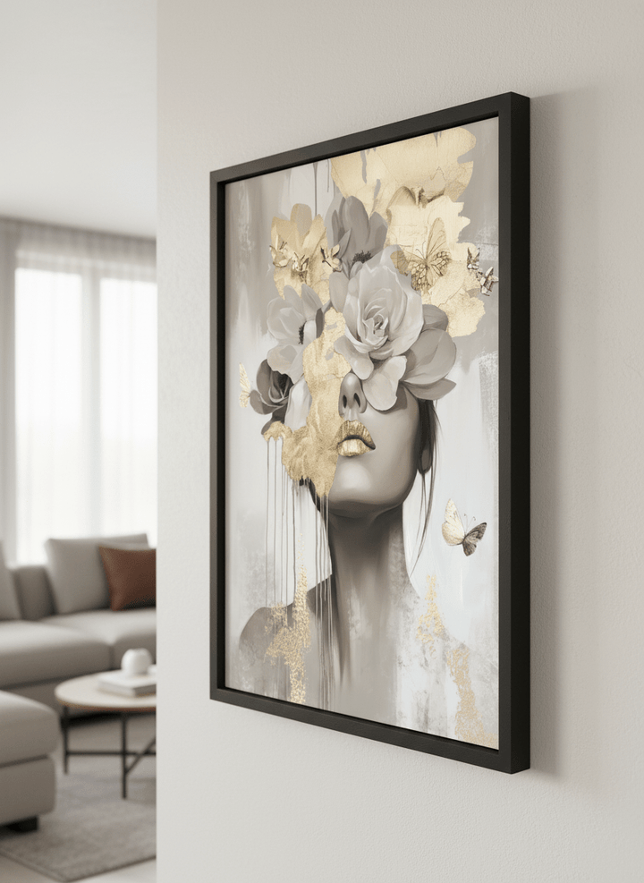 Modern wall art styled above a sofa in a neutral living room