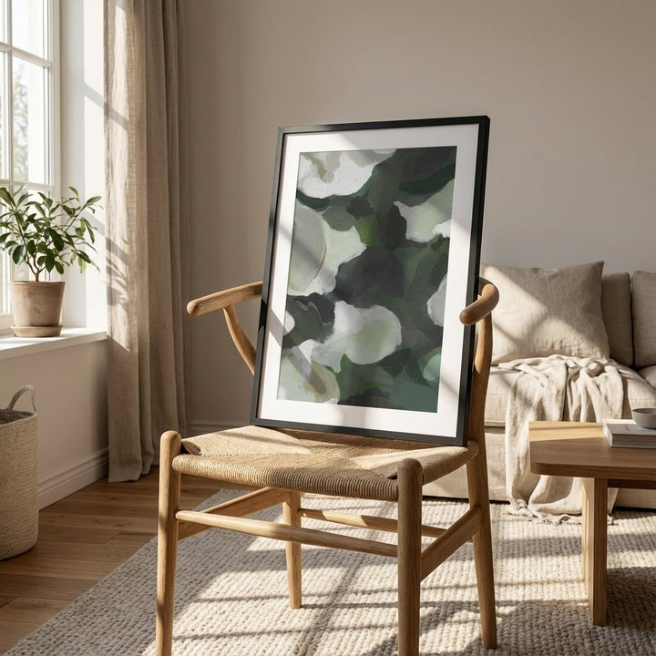 artwork on a wooden chair in a cozy living room.