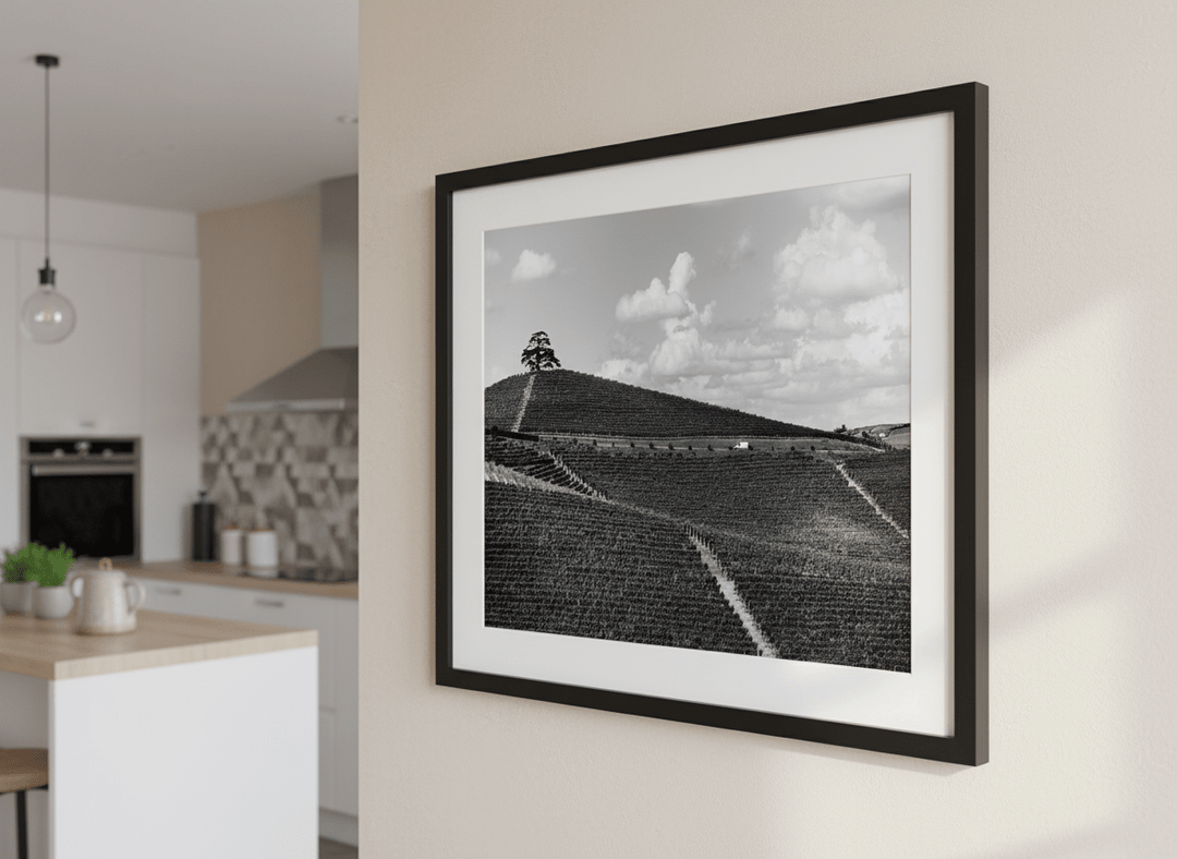 Artwork styled on the wall of a bright modern kitchen
