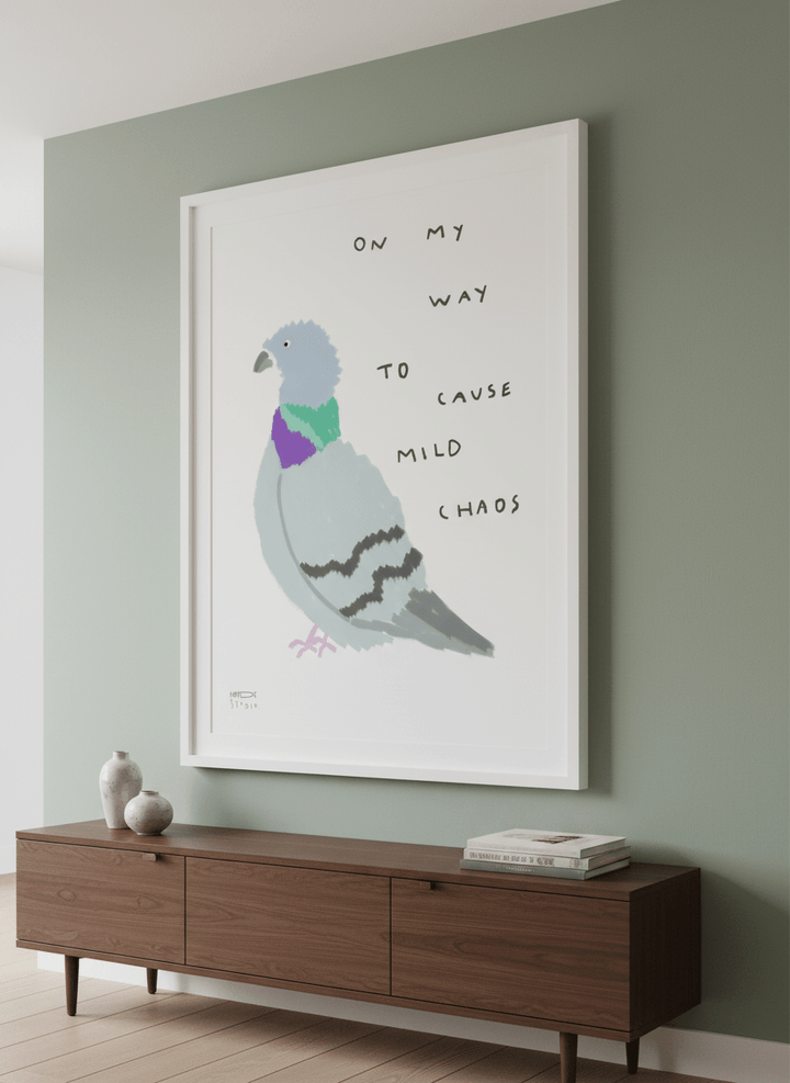 Wall art styled above a dining table in a contemporary home
