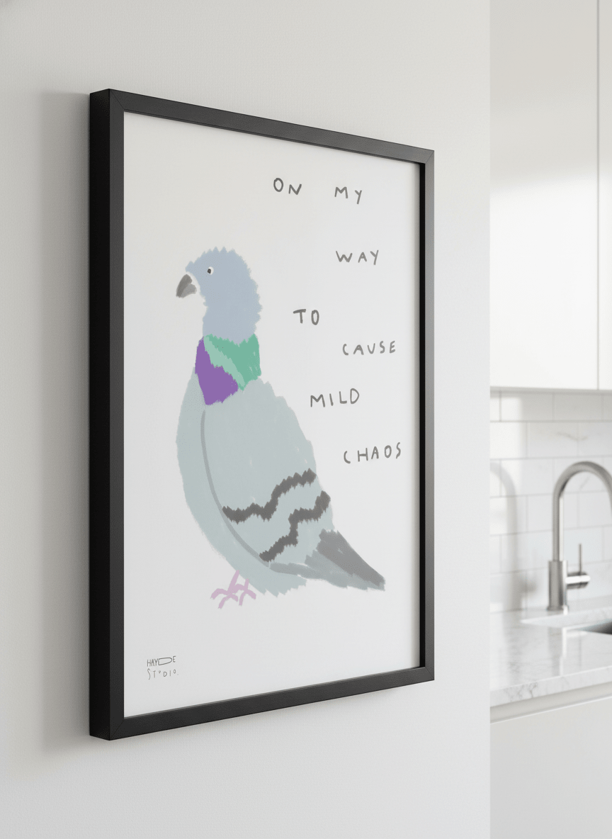 Artwork styled on the wall of a bright modern kitchen